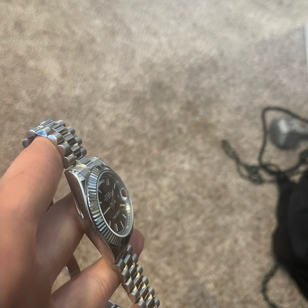 black and silver luxury watch